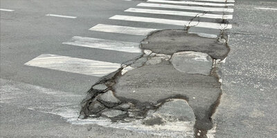 Schade aan asfaltering